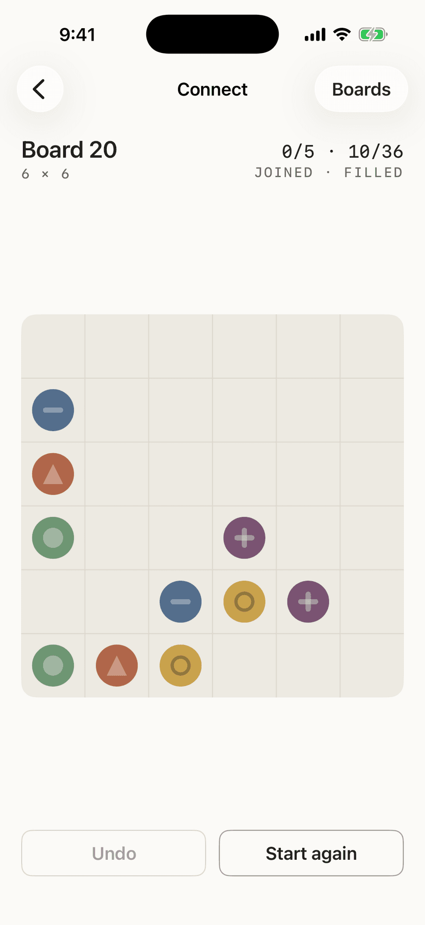 A Connect board with pairs of colored dots waiting to be joined, each dot carrying its own shape.