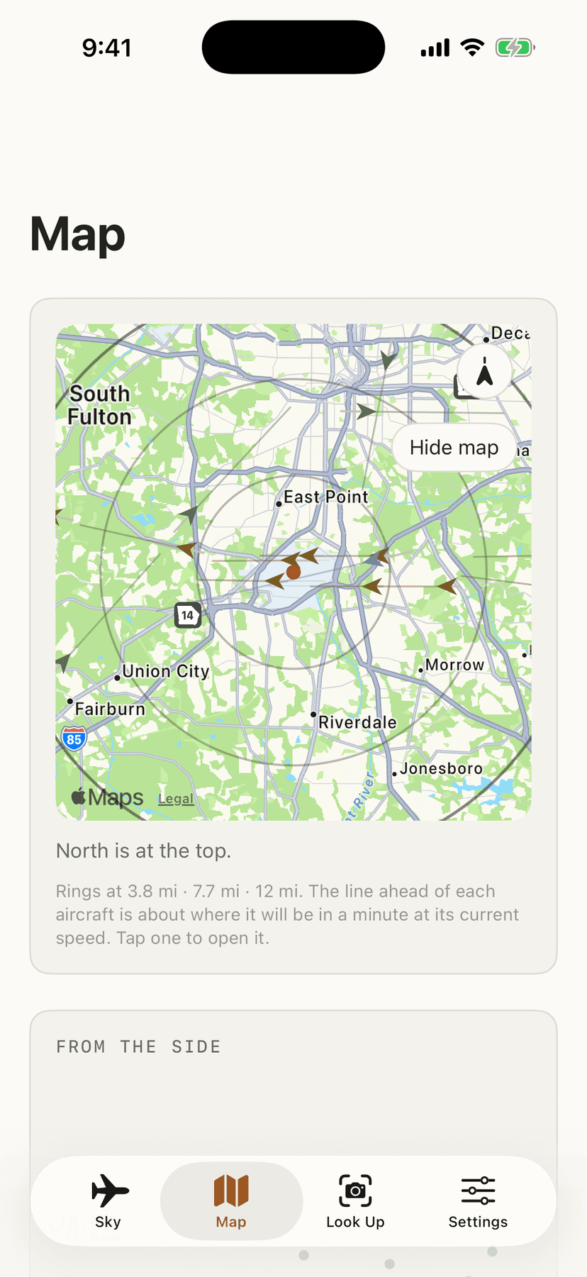 The Map tab: the aircraft around you on range rings, over Apple's map — which is optional and off until you turn it on. Each aircraft points the way it is flying, with a faint line showing where it will be in a minute.